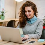 Lady using laptop for Microsoft Dynamics business