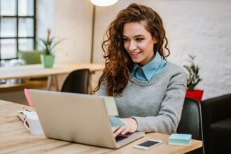 Lady using laptop for Microsoft Dynamics business