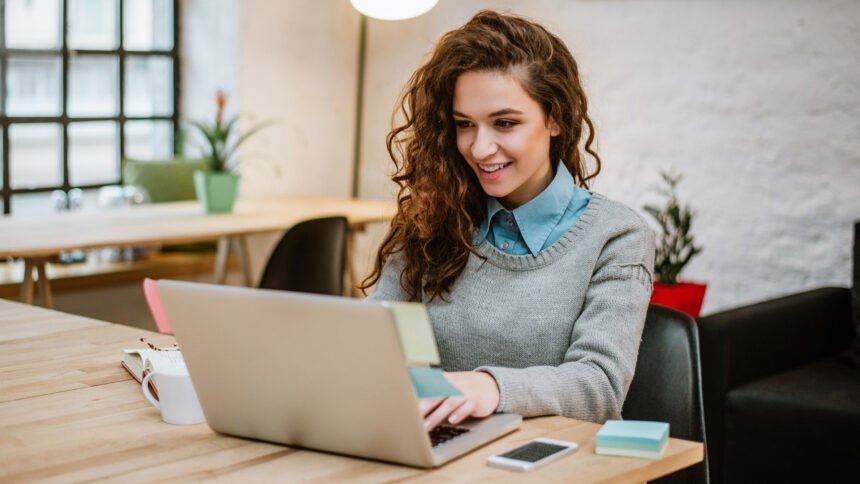 Lady using laptop for Microsoft Dynamics business